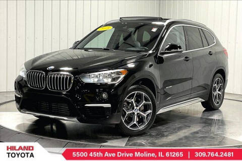 2018 BMW X1 for sale at HILAND TOYOTA in Moline IL
