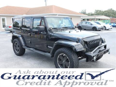 2012 Jeep Wrangler Unlimited for sale at Universal Auto Sales in Plant City FL