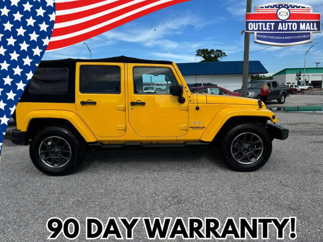 2015 Jeep Wrangler Unlimited for sale at Outlet Auto Mall in Okeechobee, FL