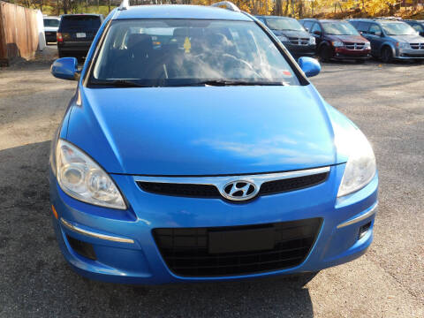 2011 Hyundai Elantra Touring for sale at Macrocar Sales Inc in Uniontown OH