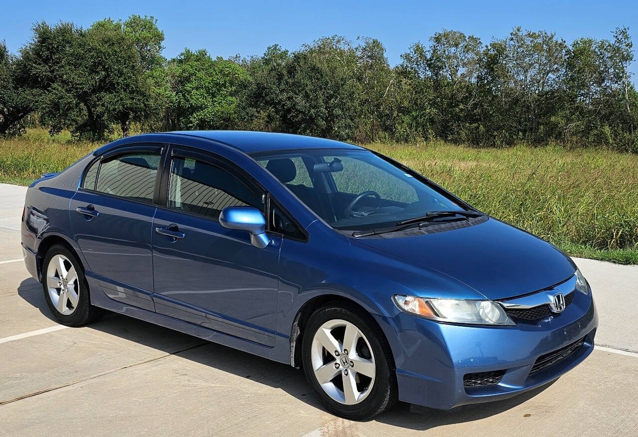 2011 Honda Civic for sale at CAR MARKET AUTO GROUP in Sugar Land, TX