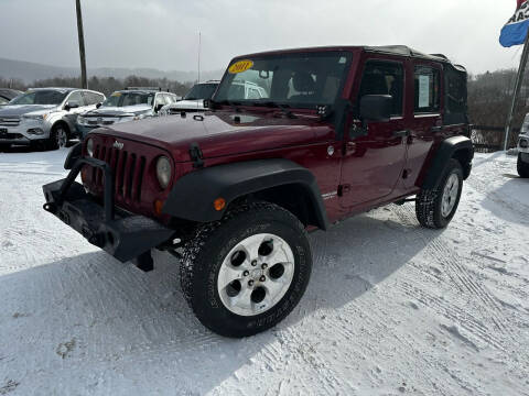 2011 Jeep Wrangler Unlimited for sale at Pine Grove Auto Sales LLC in Russell PA