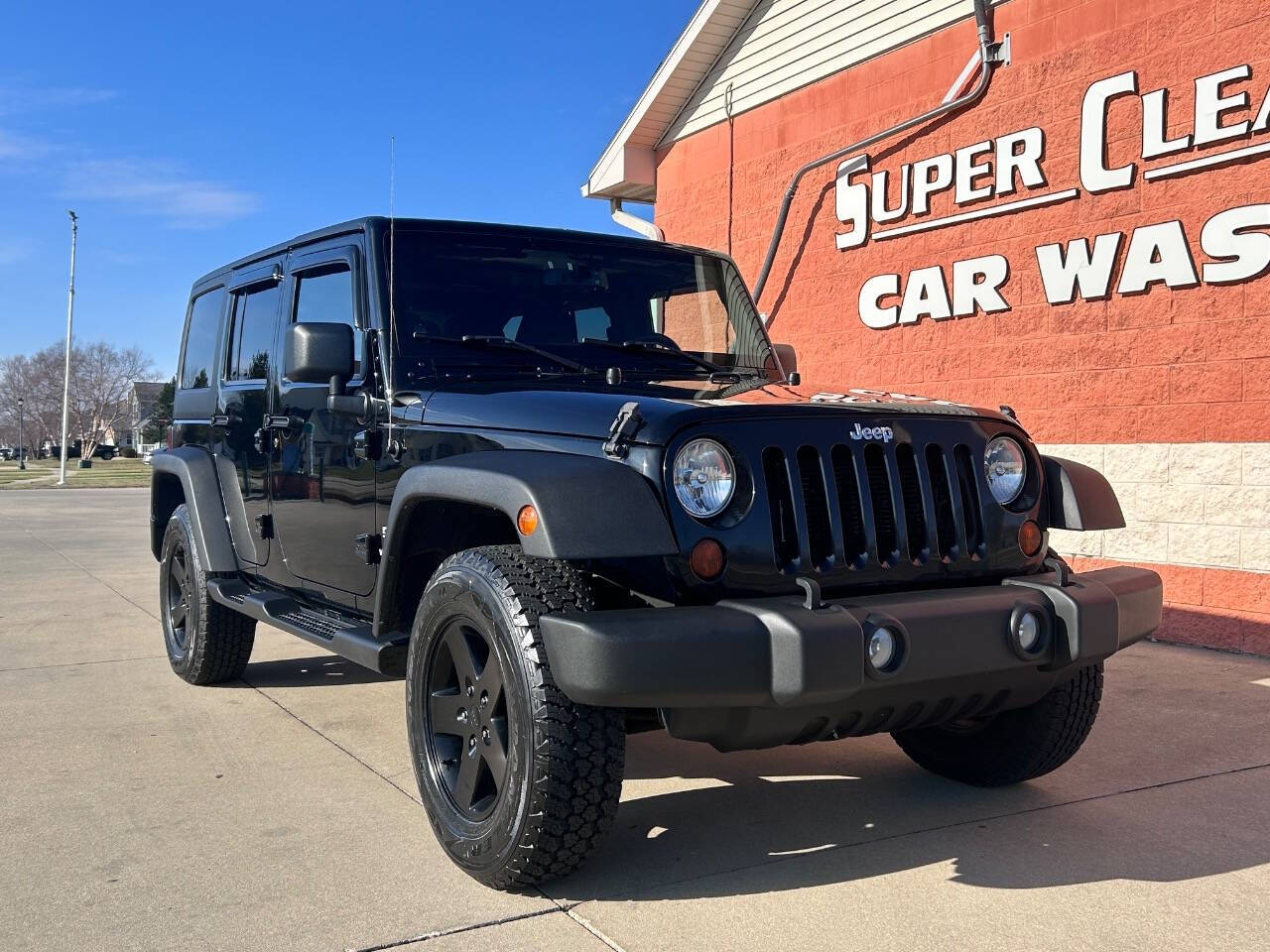 2014 Jeep Wrangler Unlimited for sale at Illinois Auto Wholesalers in Tolono, IL