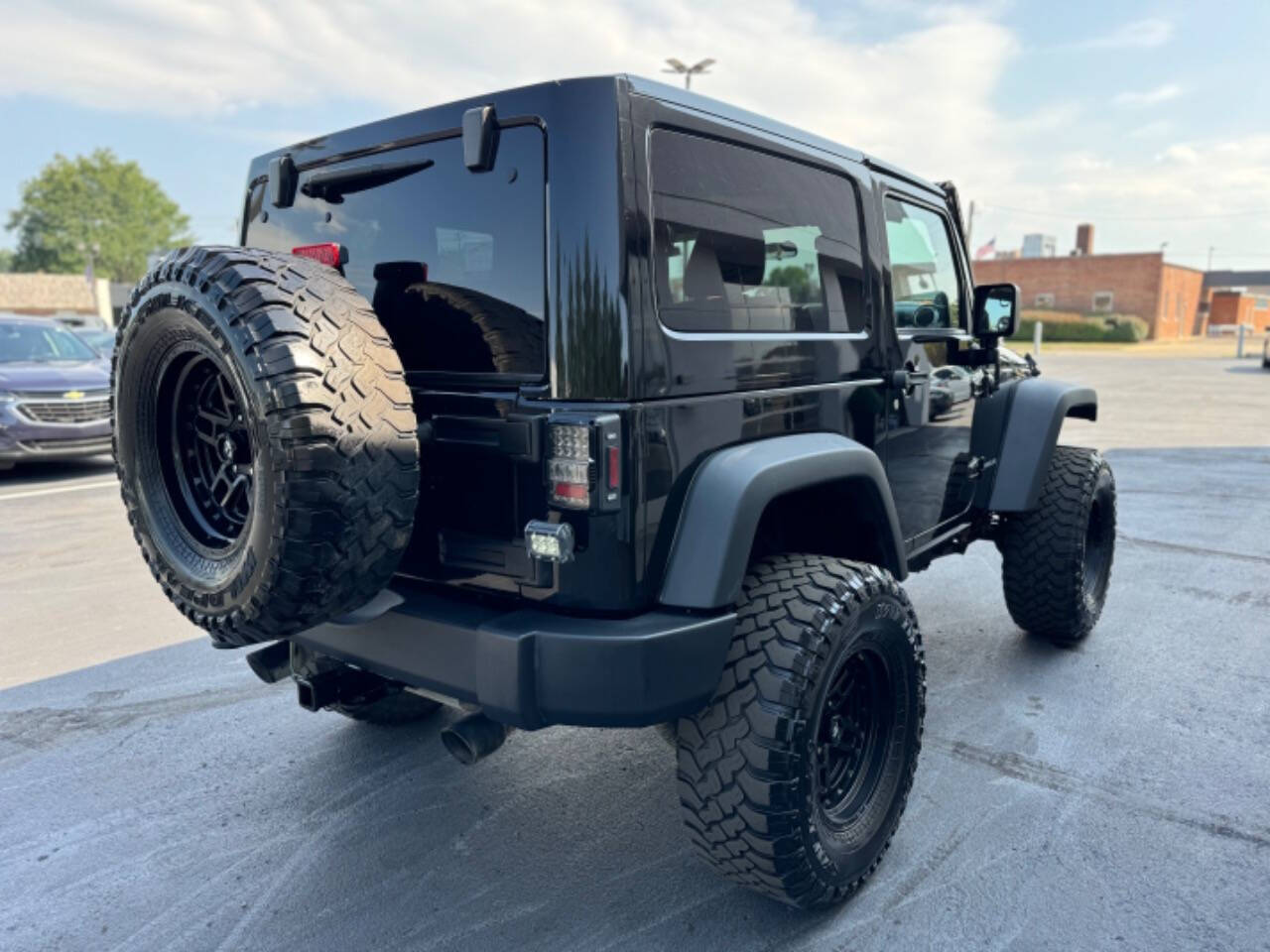 2012 Jeep Wrangler for sale at Opus Motorcars in Utica, MI