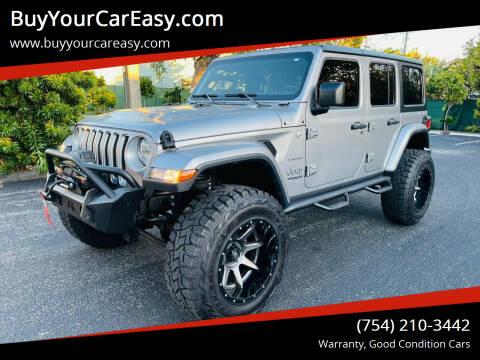 2019 Jeep Wrangler Unlimited for sale at BuyYourCarEasyllc.com in Hollywood FL