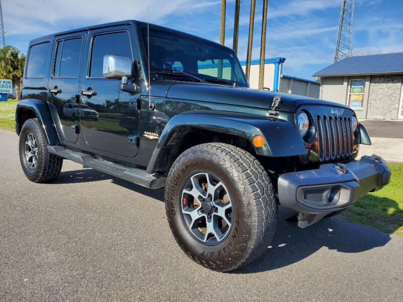 2012 Jeep Wrangler Unlimited for sale at Mox Motors in Port Charlotte FL