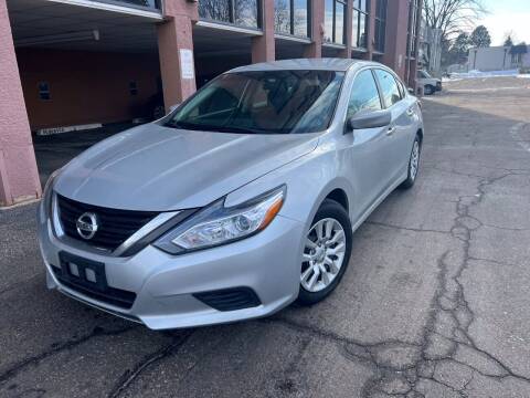 2016 Nissan Altima for sale at AROUND THE WORLD AUTO SALES in Denver CO