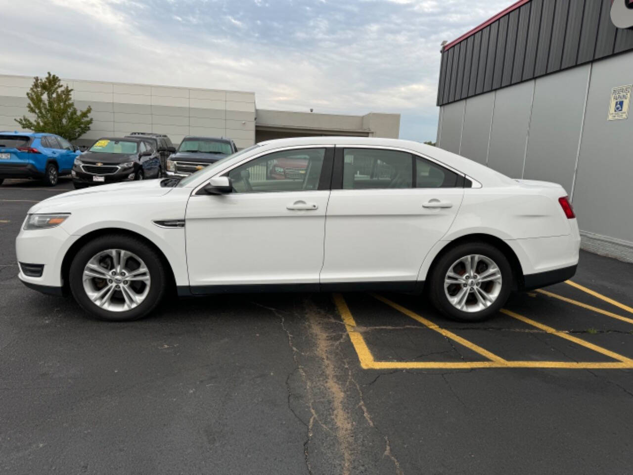 2014 Ford Taurus for sale at Carventure in Lansing, MI