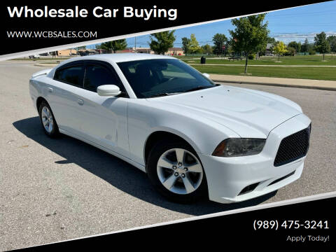 2013 Dodge Charger for sale at Wholesale Car Buying in Saginaw MI
