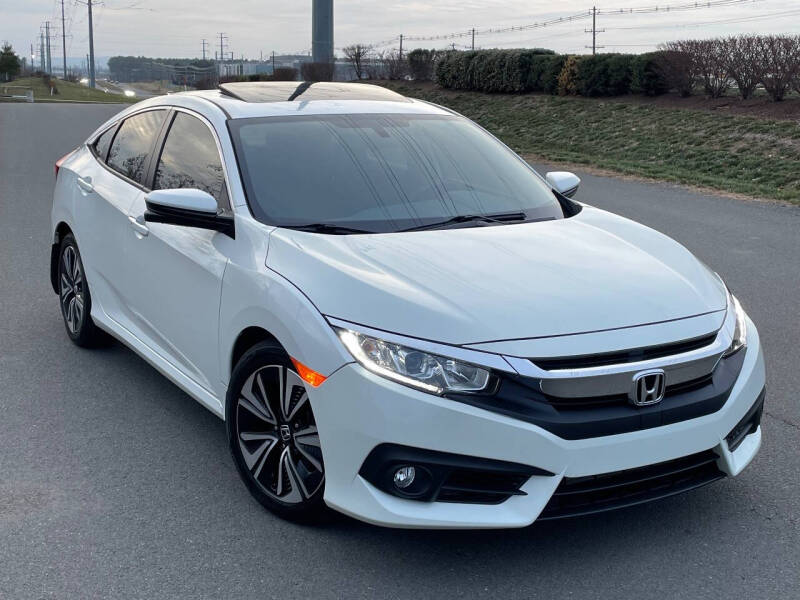 2017 Honda Civic for sale at BOOST MOTORS LLC in Sterling VA