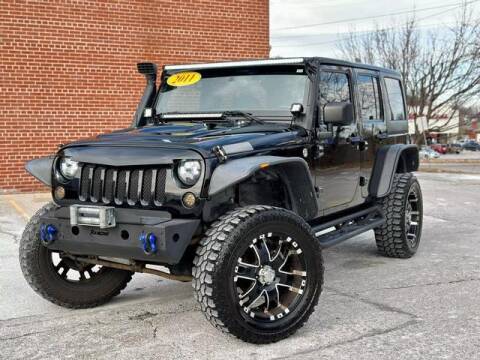 2011 Jeep Wrangler Unlimited for sale at ARCH AUTO SALES in Saint Louis MO
