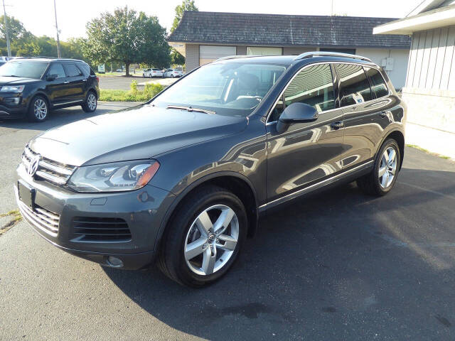 2014 Volkswagen Touareg for sale at Lakeshore Autos in Holland, MI