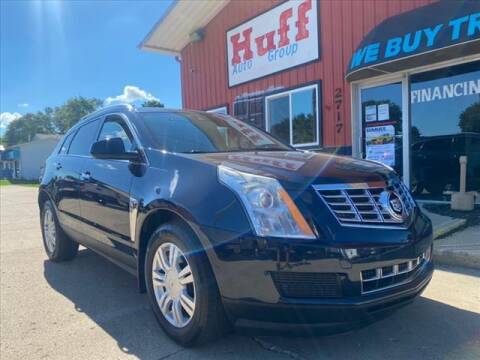 2015 Cadillac SRX for sale at HUFF AUTO GROUP in Jackson MI