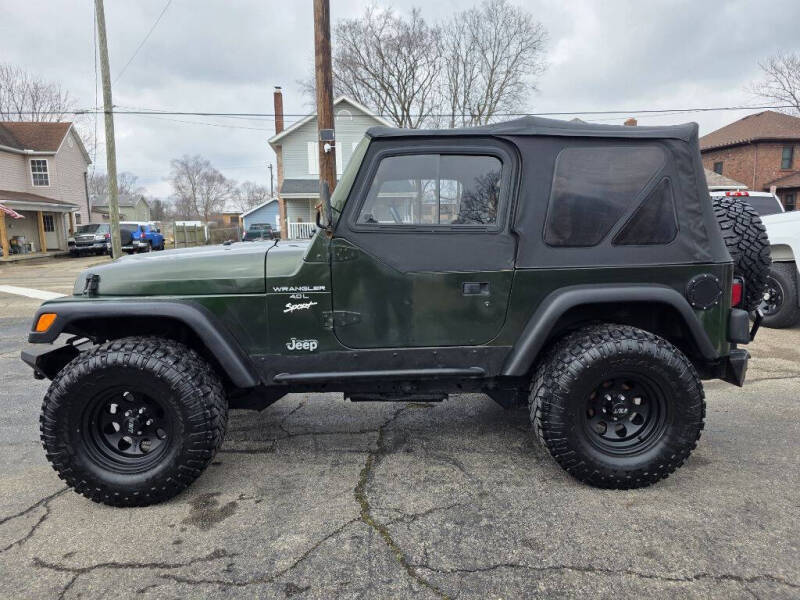 1998 Jeep Wrangler for sale at ELLENBURG MOTORS LLC in Franklin OH