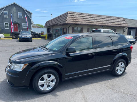 2016 Dodge Journey for sale at MAGNUM MOTORS in Reedsville PA
