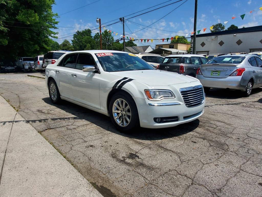 2014 Chrysler 300 for sale at DAGO'S AUTO SALES LLC in Dalton, GA