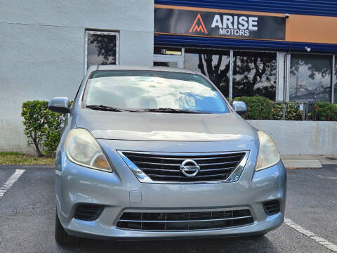 2013 Nissan Versa for sale at ARISE MOTORS in Pompano Beach FL