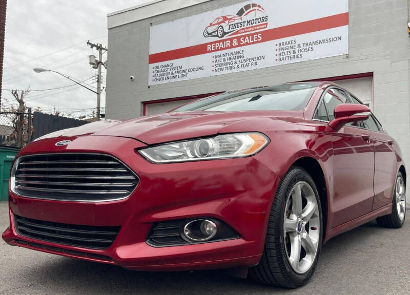 2014 Ford Fusion for sale at FINEST MOTORS LLC in Buffalo NY