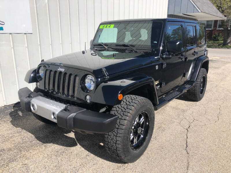 Used 2015 Jeep Wrangler Unlimited Sahara with VIN 1C4HJWEG6FL606547 for sale in Beardstown, IL