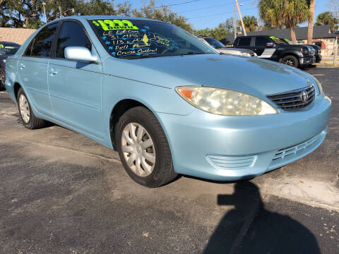2005 Toyota Camry for sale at RIVERSIDE MOTORCARS INC - South Lot in New Smyrna Beach FL