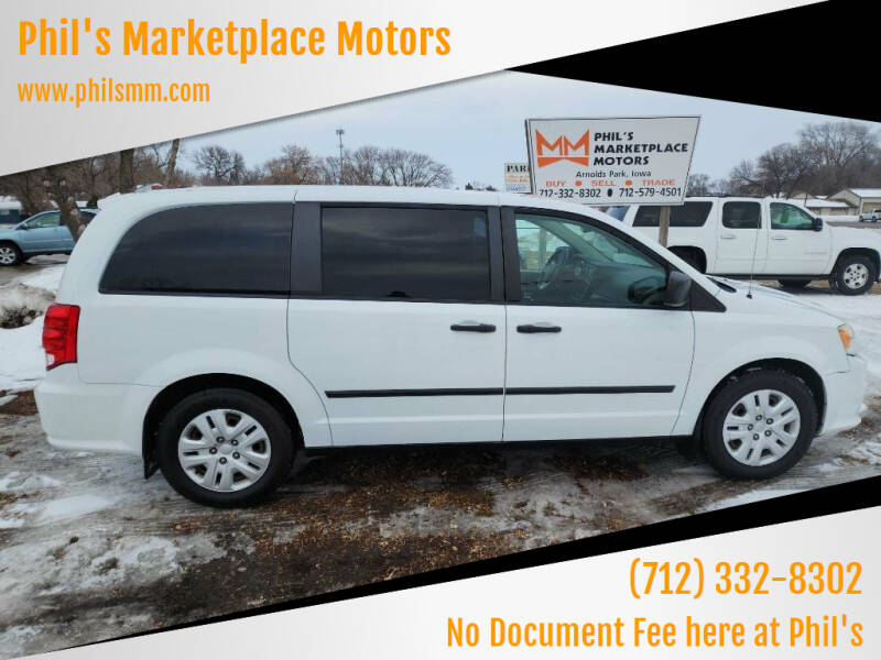 2014 Dodge Grand Caravan for sale at Phil's Marketplace Motors in Arnolds Park IA