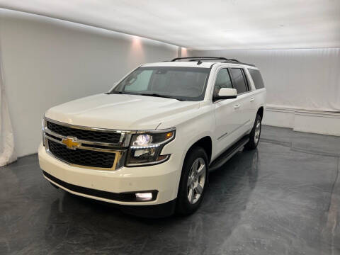 2015 Chevrolet Suburban for sale at Roman's Auto Sales in Warren MI