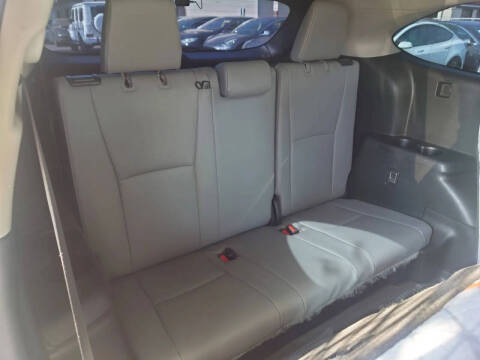 2023 Toyota Highlander Hybrid Bronze Edition