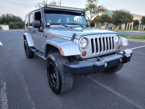 2013 Jeep Wrangler Unlimited for sale at AWESOME CARS LLC in Austin TX