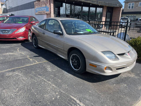 2002 Pontiac Sunfire for sale at Holiday Auto Sales in Grand Rapids MI