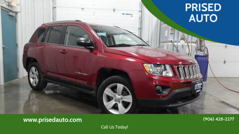 2011 Jeep Compass for sale at PRISED AUTO in Gladstone MI