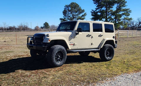 2011 Jeep Wrangler Unlimited for sale at RocknR Auto Ranch in Bellevue TX