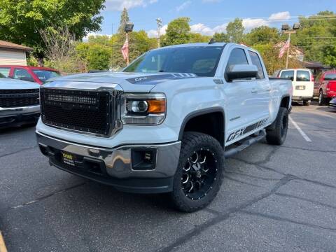 2015 GMC Sierra 1500 for sale at Chinos Auto Sales in Crystal MN