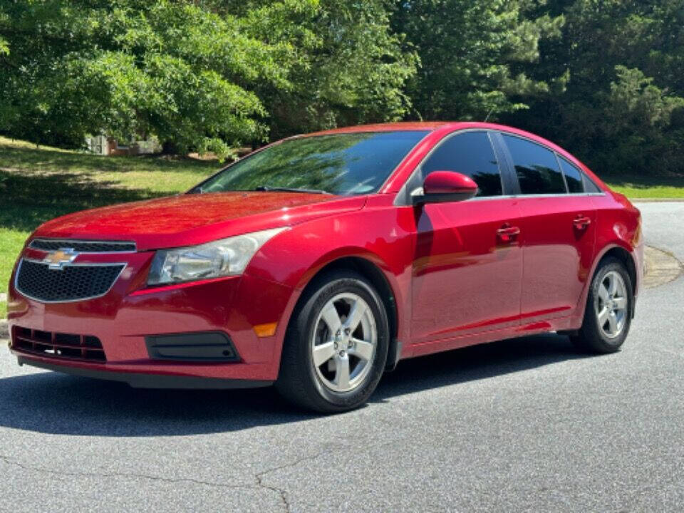 2014 Chevrolet Cruze for sale at SHURE AUTO SALES in Snellville, GA