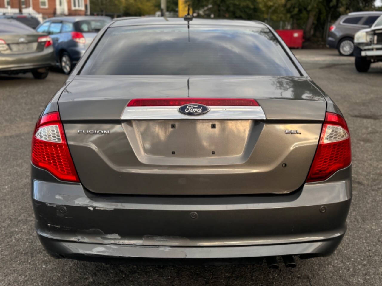 2012 Ford Fusion for sale at Walkem Autos in District Heights, MD