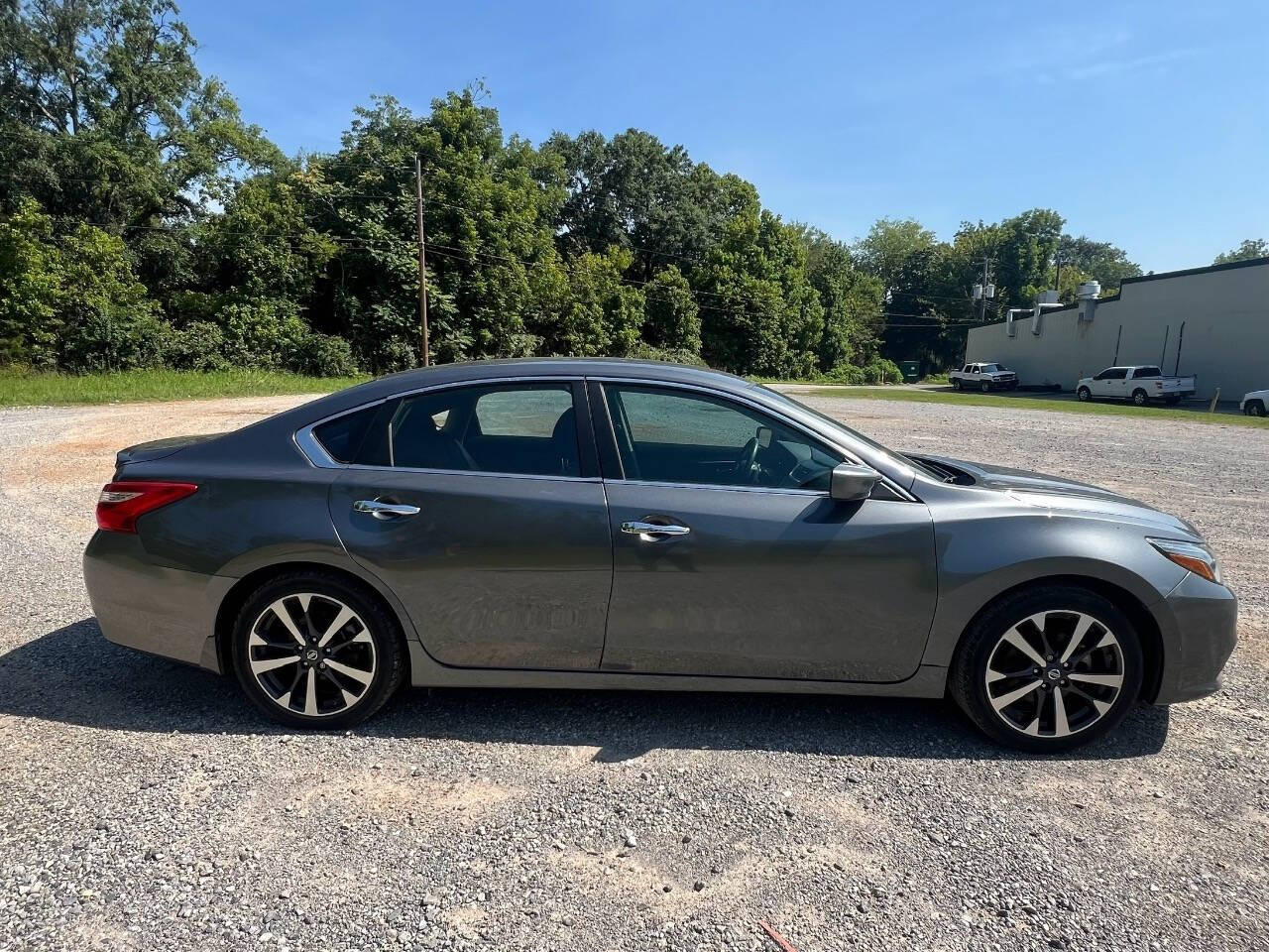 2016 Nissan Altima for sale at Guadalupe Auto Sales, LLC. in Jemison, AL