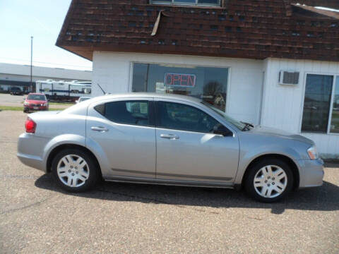2014 Dodge Avenger for sale at Paul Oman's Westside Auto Sales in Chippewa Falls WI