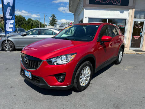 2014 Mazda CX-5 for sale at ADAM AUTO AGENCY in Rensselaer NY