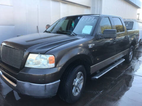 2005 Ford F-150 for sale at Buy-Fast Autos in Houston TX