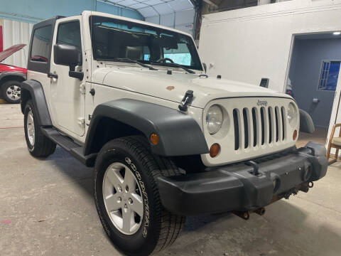 2009 Jeep Wrangler for sale at NE Autos Inc in Norton MA