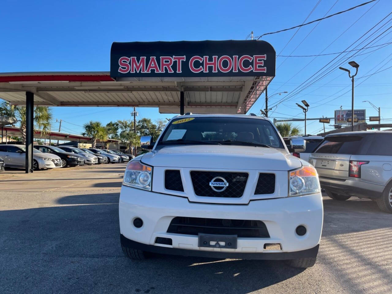 2012 Nissan Armada for sale at SMART CHOICE AUTO in Pasadena, TX