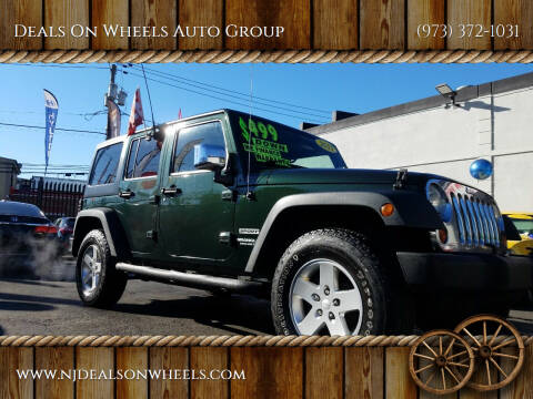 2011 Jeep Wrangler Unlimited for sale at Deals On Wheels Auto Group in Irvington NJ