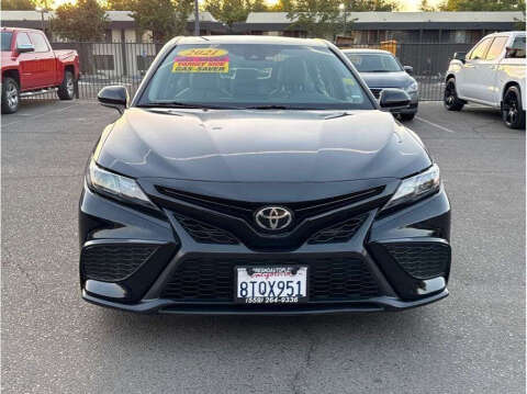 2021 Toyota Camry for sale at Armando Auto Sales in Fresno CA