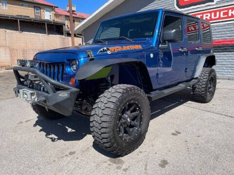 2010 Jeep Wrangler Unlimited for sale at Red Rock Auto Sales in Saint George UT