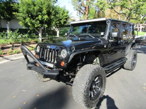 2012 Jeep Wrangler Unlimited for sale at E MOTORCARS in Fullerton CA
