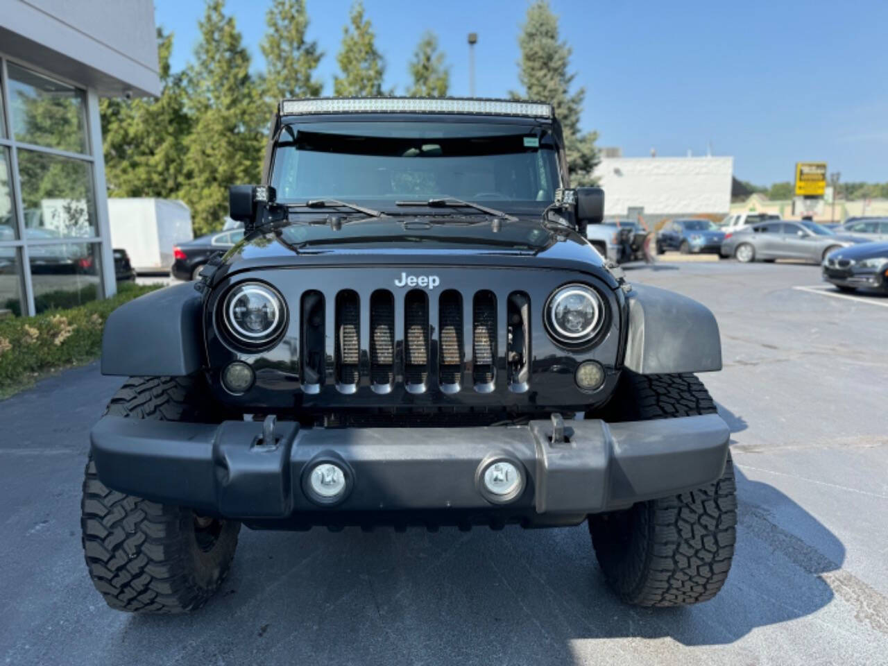 2012 Jeep Wrangler for sale at Opus Motorcars in Utica, MI