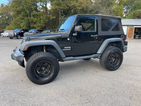 2014 Jeep Wrangler for sale at Adairsville Auto Mart in Plainville GA