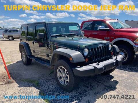 2012 Jeep Wrangler Unlimited for sale at Turpin Chrysler Dodge Jeep Ram in Dubuque IA