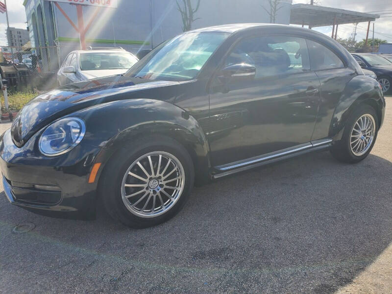 2012 Volkswagen Beetle for sale at INTERNATIONAL AUTO BROKERS INC in Hollywood FL