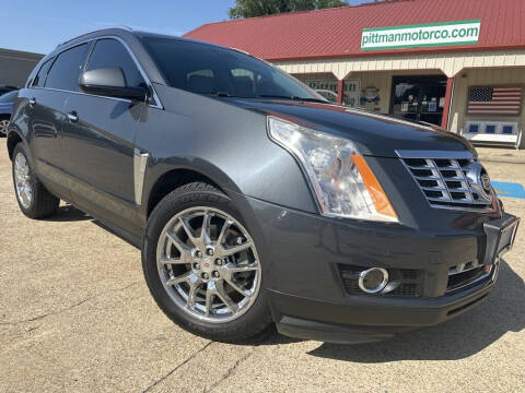 2013 Cadillac SRX for sale at PITTMAN MOTOR CO in Lindale TX