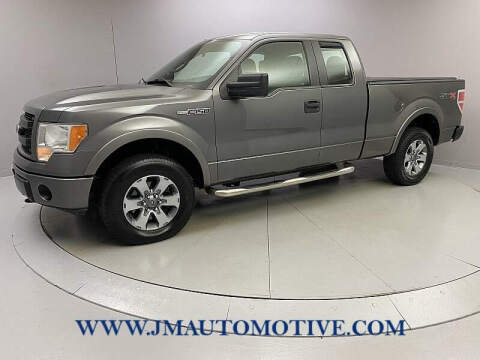 2013 Ford F-150 for sale at J & M Automotive in Naugatuck CT